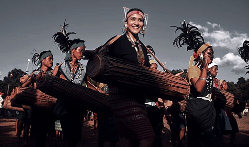Visitor Beating Drum during Garo Wangala Festival 2024