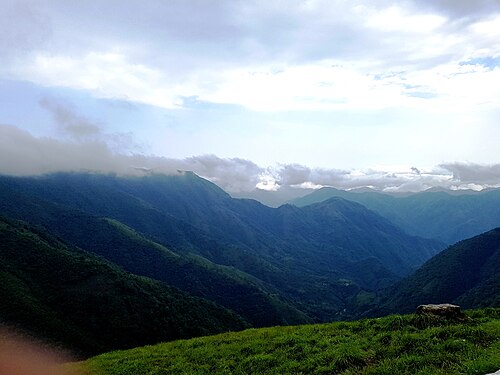 View along the road to Shillong from Mawlynnong at height of 300 meters of the hills and valleys that lead on to Bangladesh